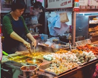 woman cooking street foods