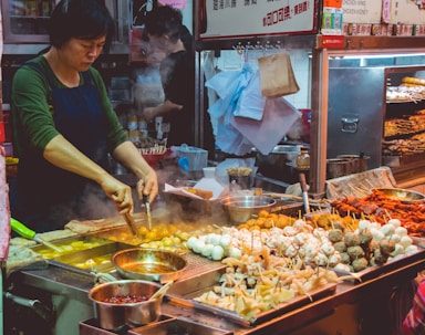 woman cooking street foods