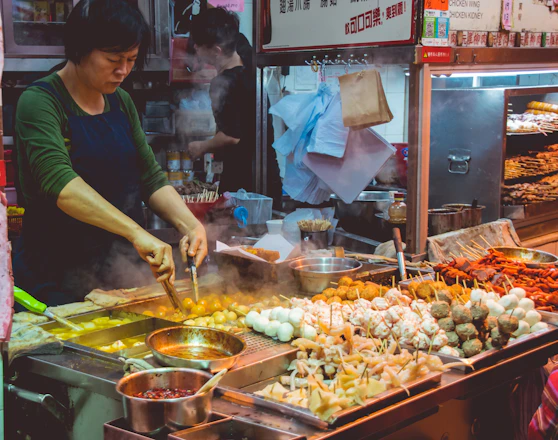 woman cooking street foods