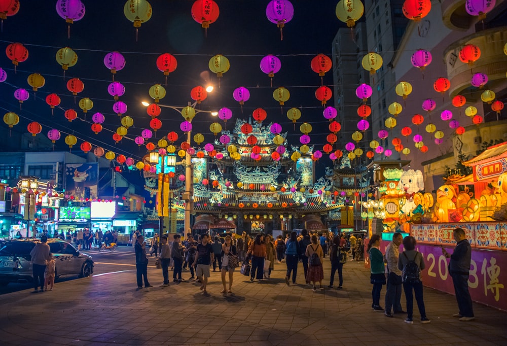 people gathering outdoor during nighttime