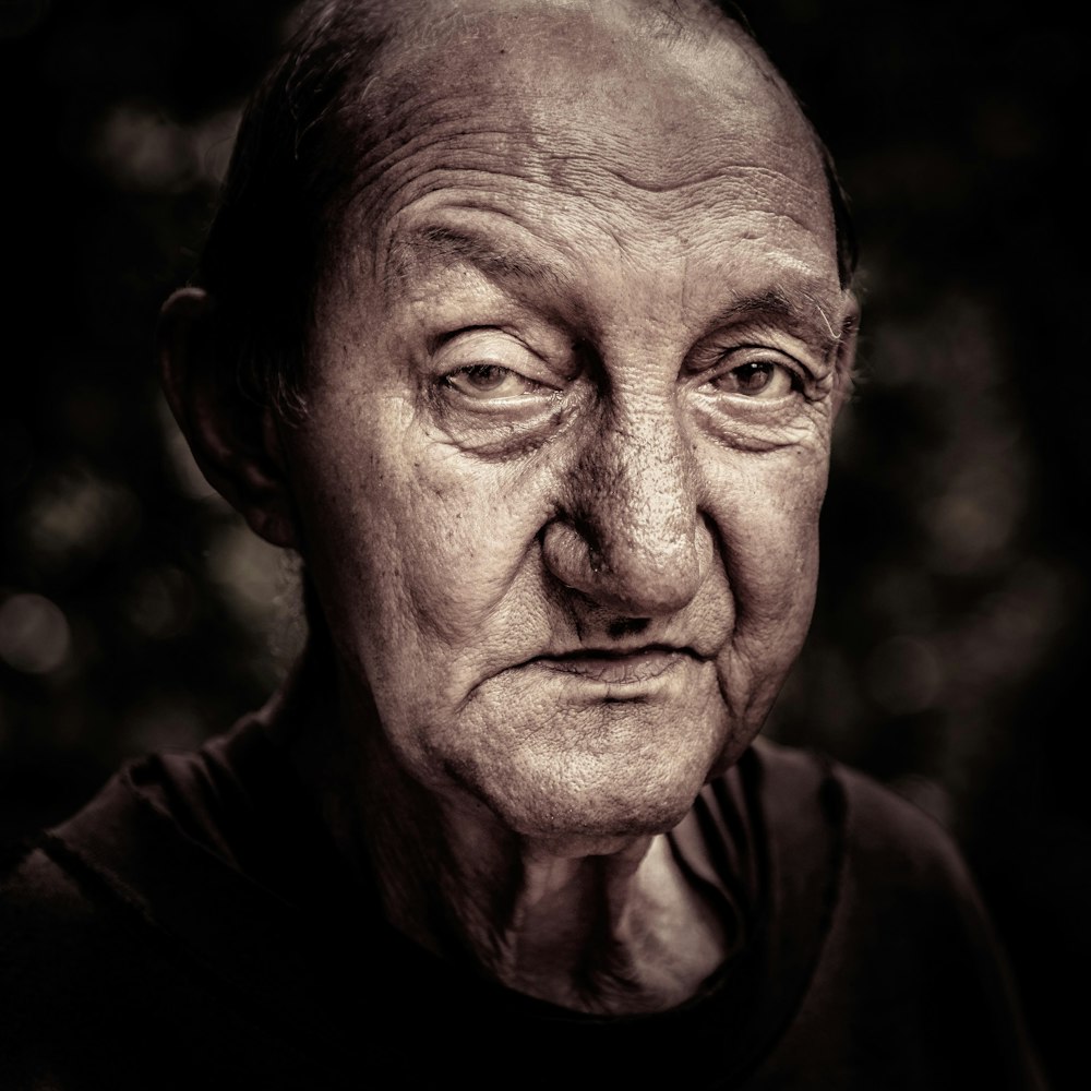 man wearing black crew-neck top