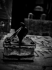A close-up of a beautifully crafted rubber stamp on a wooden desk.
