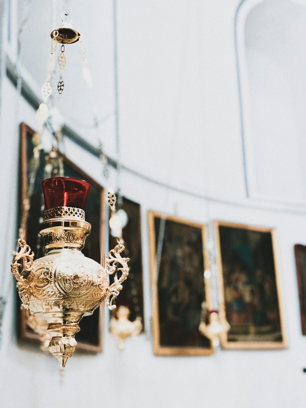 a chandelier hanging from a ceiling in a room