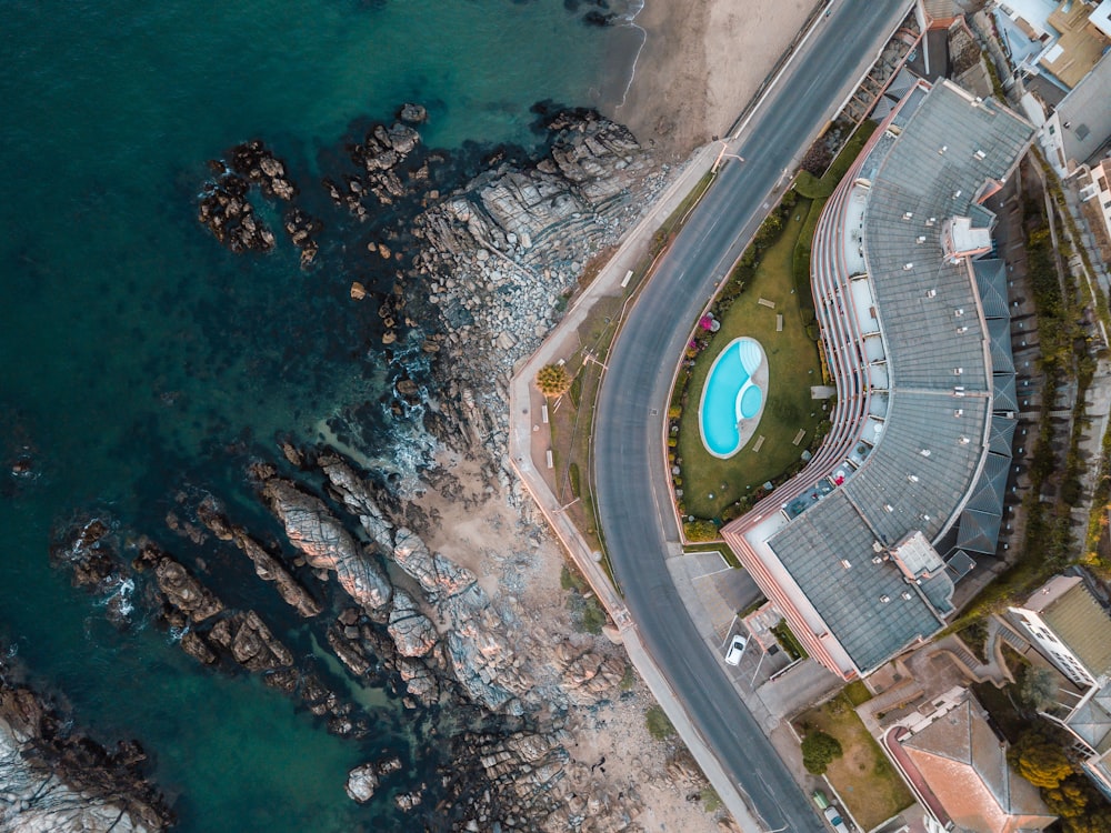 aerial photo of building near body of water during daytime