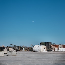 Before and after images of a cleaned industrial site.