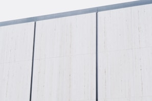 A freshly painted exterior wall with clean, smooth finish