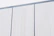 A modern exterior wall showcasing a smooth, expertly applied fresh coat of paint.