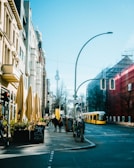 A vibrant street scene showcasing Berlin's unique architecture.