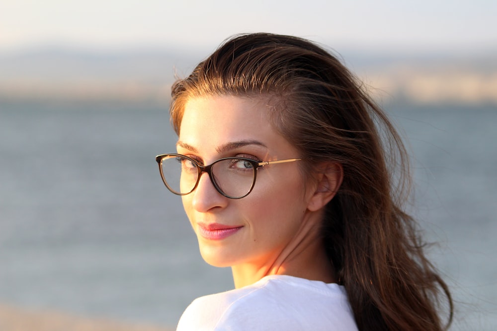 woman wearing black framed eyeglasses