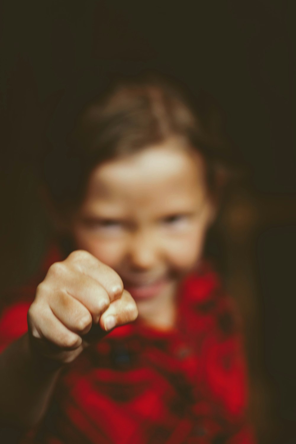 girl showing her fist