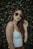 woman standing near green plantt