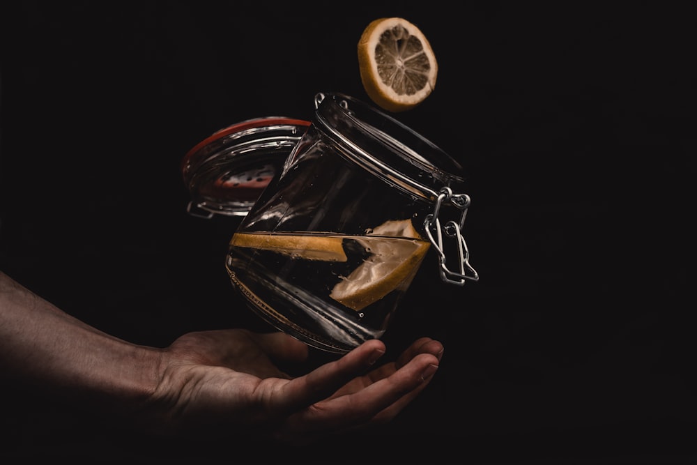 slices of lemon in clear glass jar