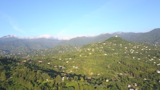 Bird's eye view of a newly completed property surrounded by lush greenery in Srivilliputhur.