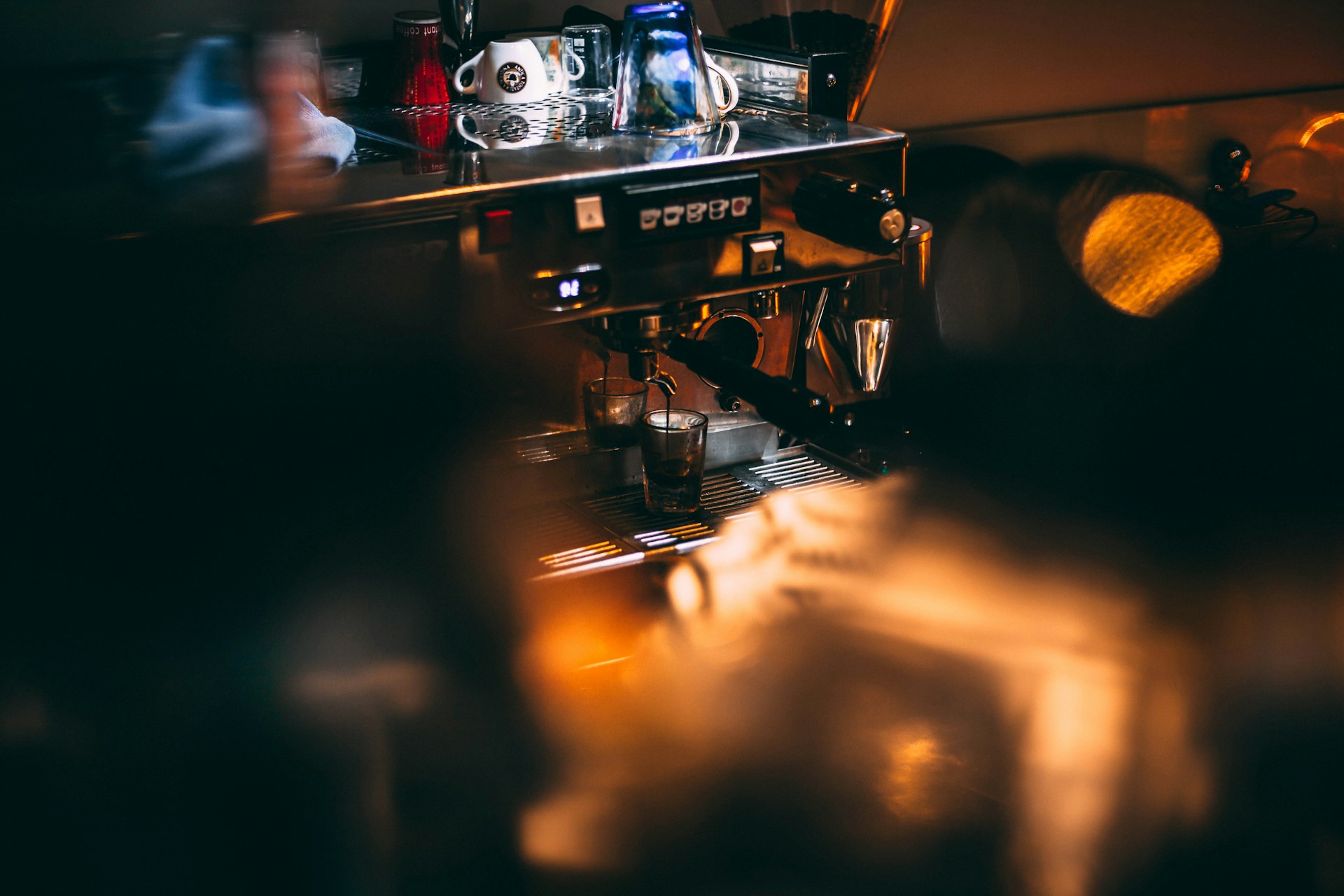 an espresso machine sitting on top of a counter