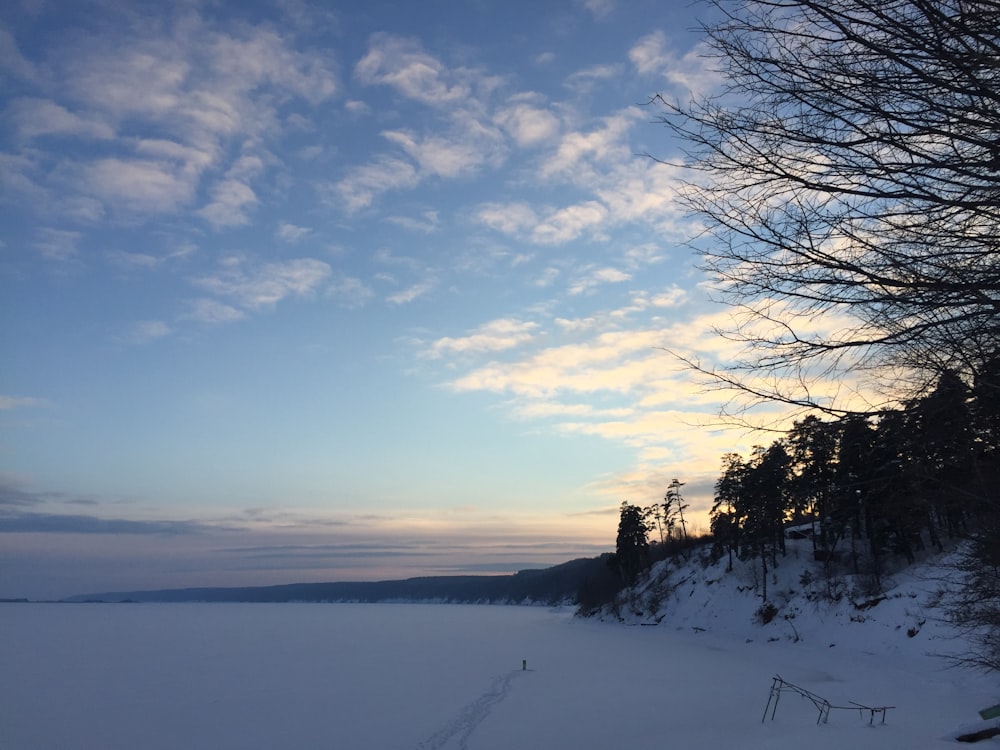 snow covered terrain during sun rise