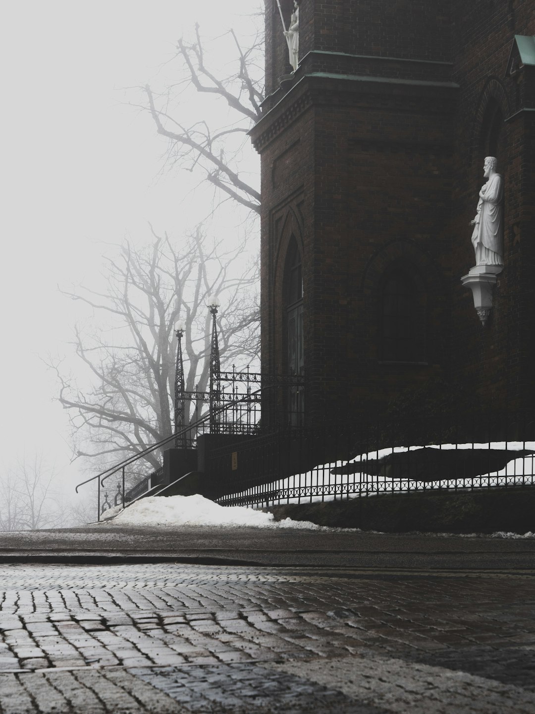 snow covered brick pathway photo