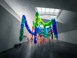 A vibrant art installation in a modern gallery space.