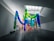 A happy client admiring a 3D art installation.