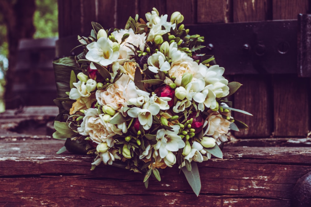 white and pink flower bouquet outdoor during daytime