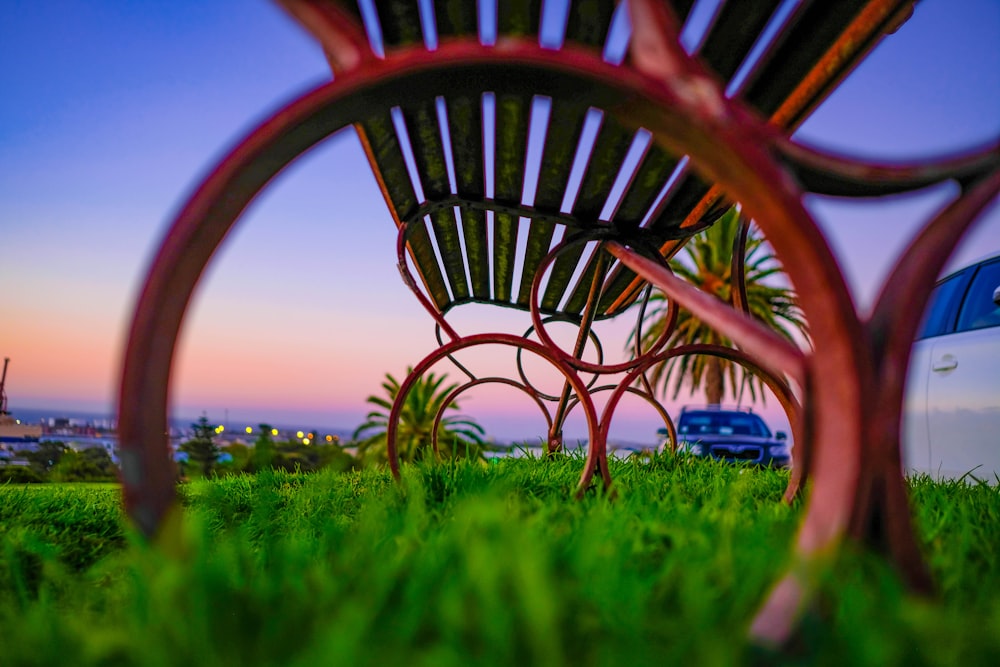 selective focus photography of red bench