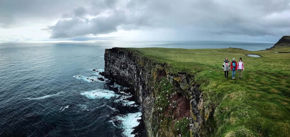 people on cliff