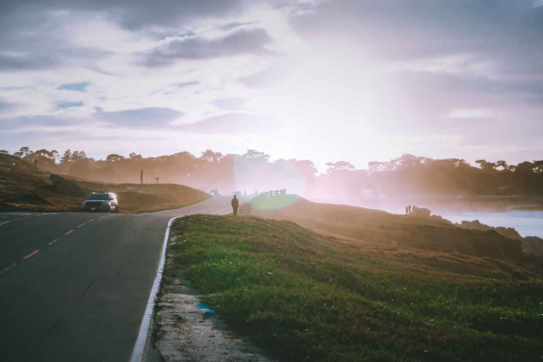 vehicle parked on road, Dramatic sunset at 17 miles drive