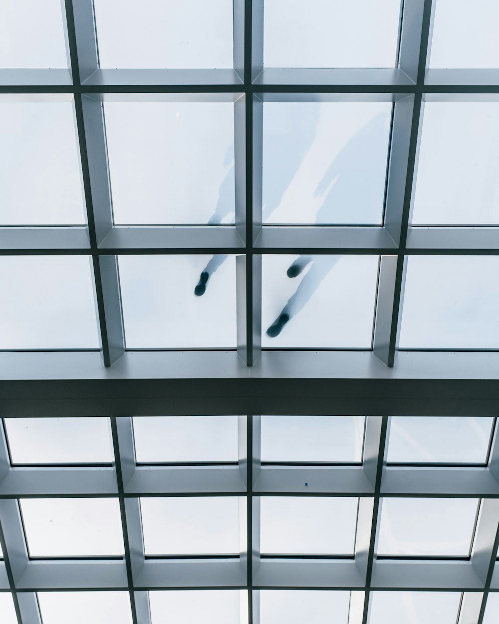 grey metal framed glass window