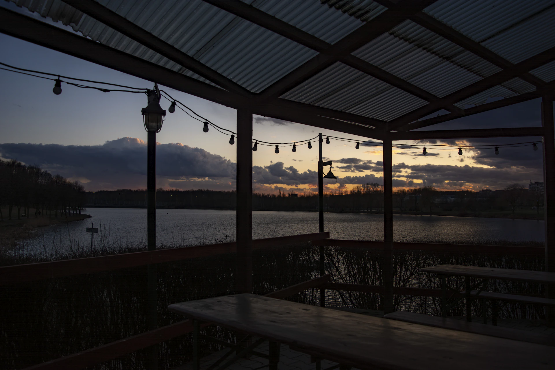 woman wearing yellow long-sleeved dress under white clouds and blue sky during daytime