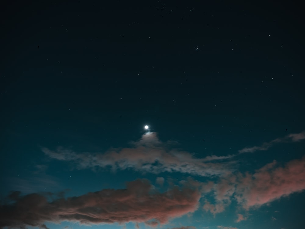 view of moon with clouds