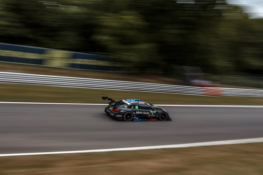 panning photography of stock car