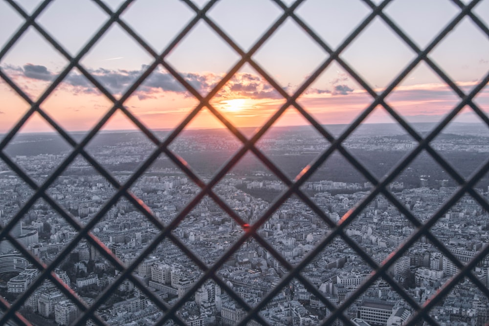 cyclone fence top-view on buildings during sunset