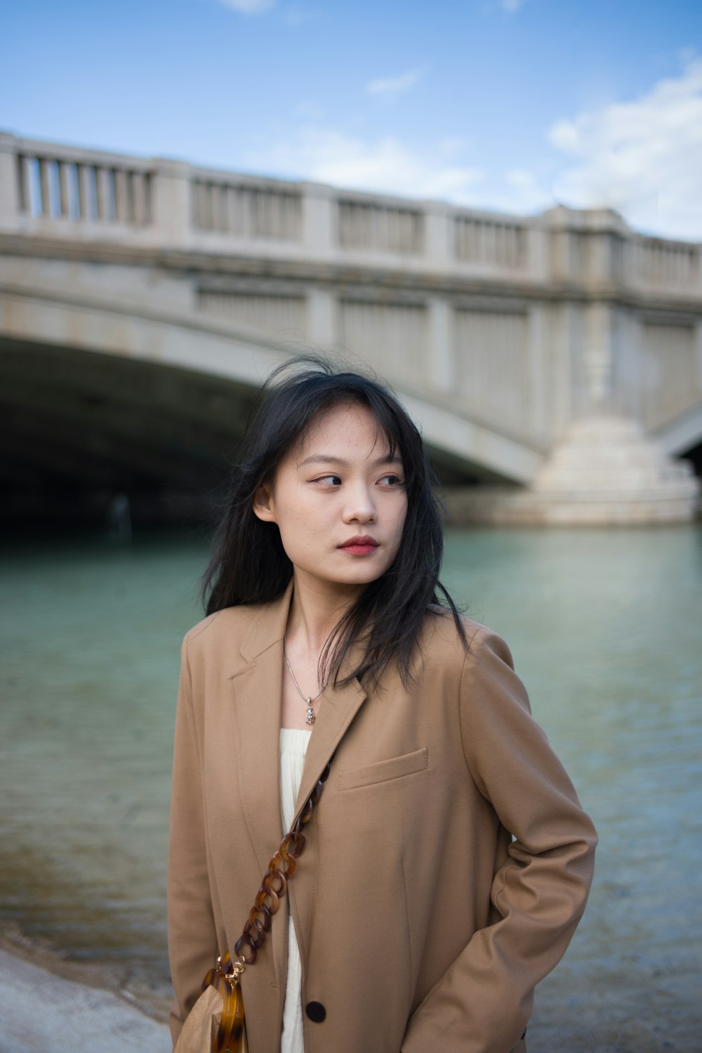 woman in brown jacket