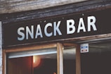 A vibrant display of custom signage for a snack bar.