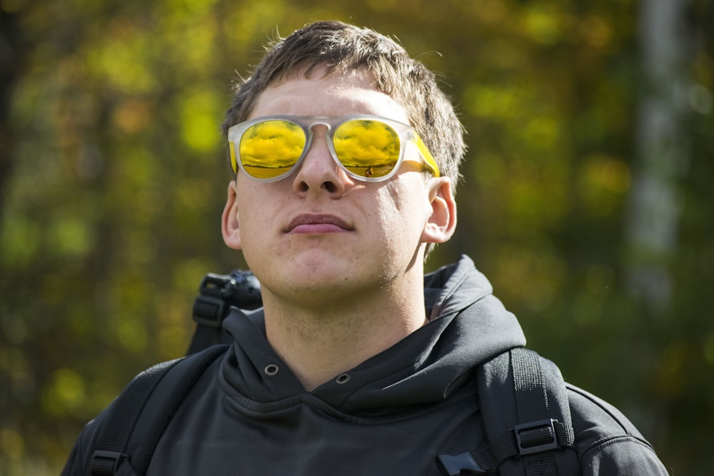 man wearing black hoodie