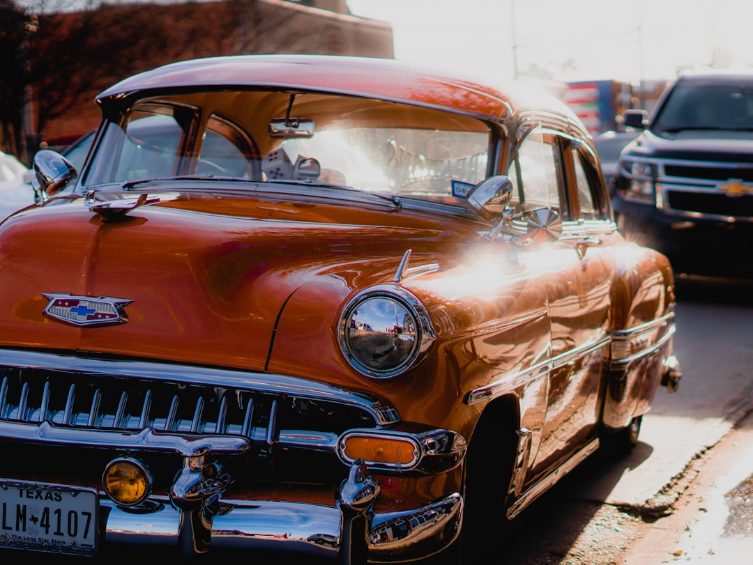 orange Cadillac vehicle