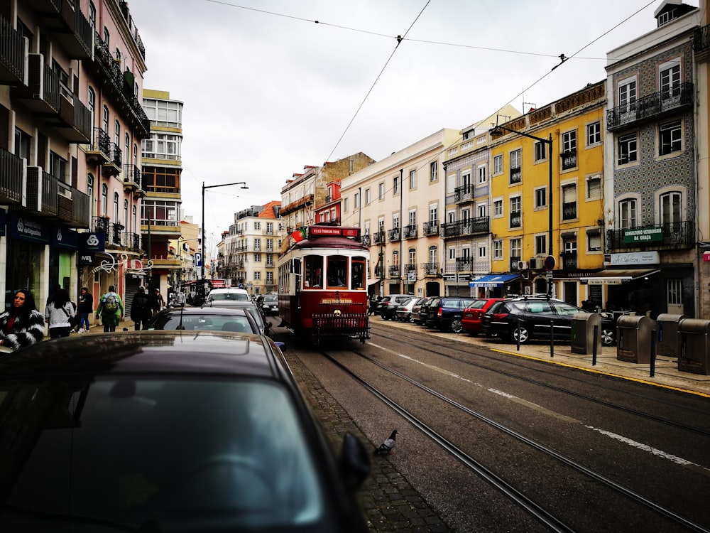 view of tram passing by near building