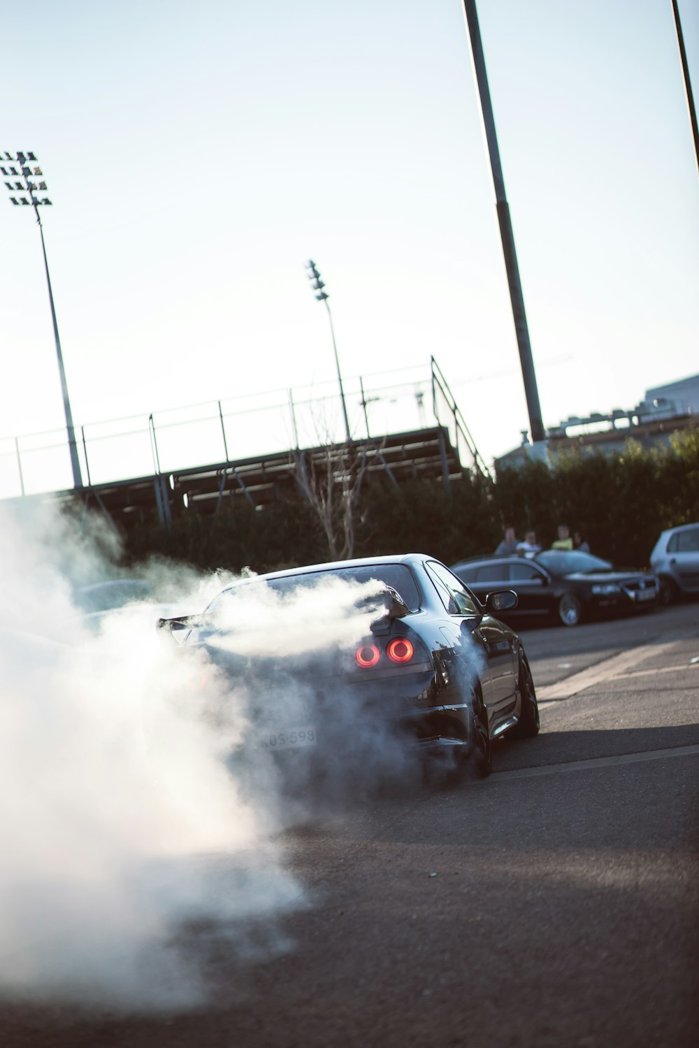 black car with smoke