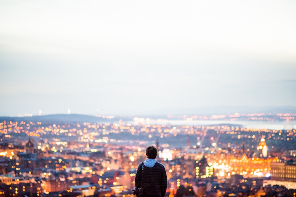 man standing in city scape view