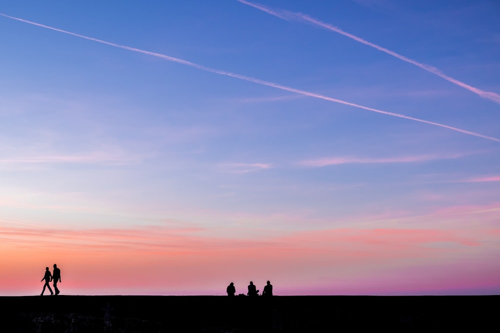 silhouette photography of five person