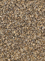 a close up of a brown and white speckled surface