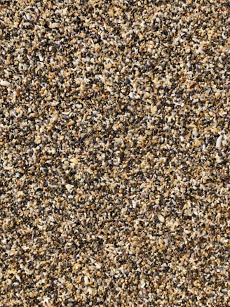 a close up of a brown and white speckled surface