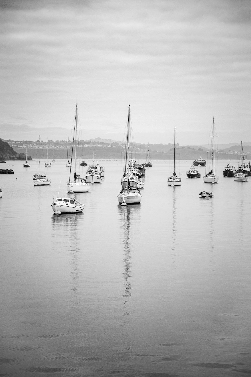 boats on calm body of water