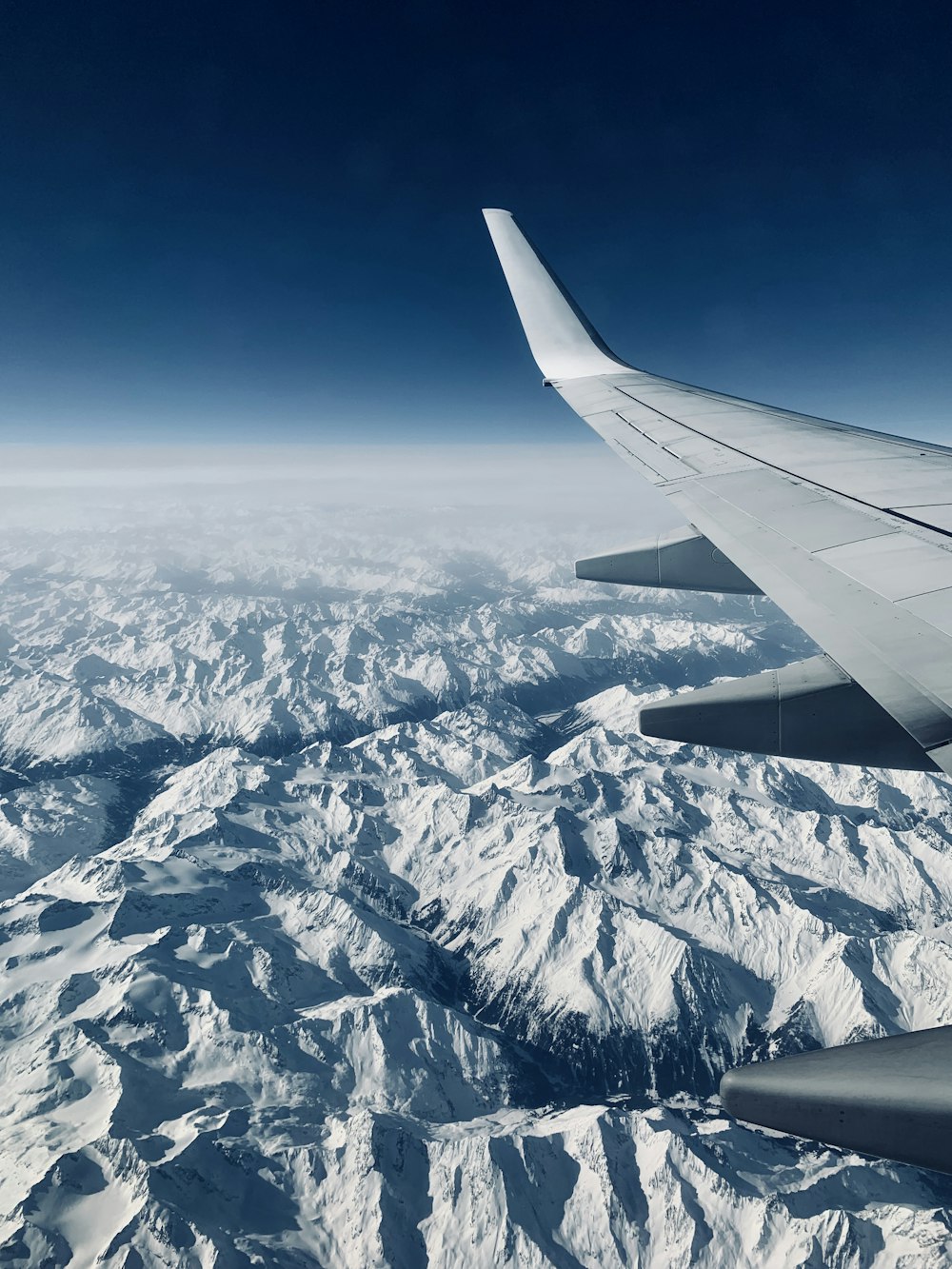 airplane view of glacier mountains