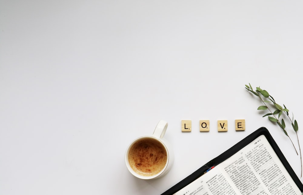 white ceramic mug with coffee