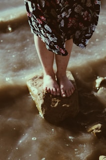 person standing on stone
