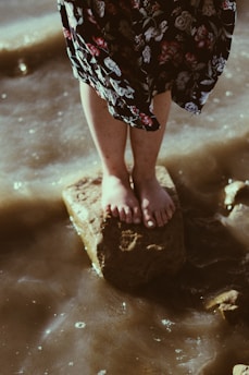 person standing on stone