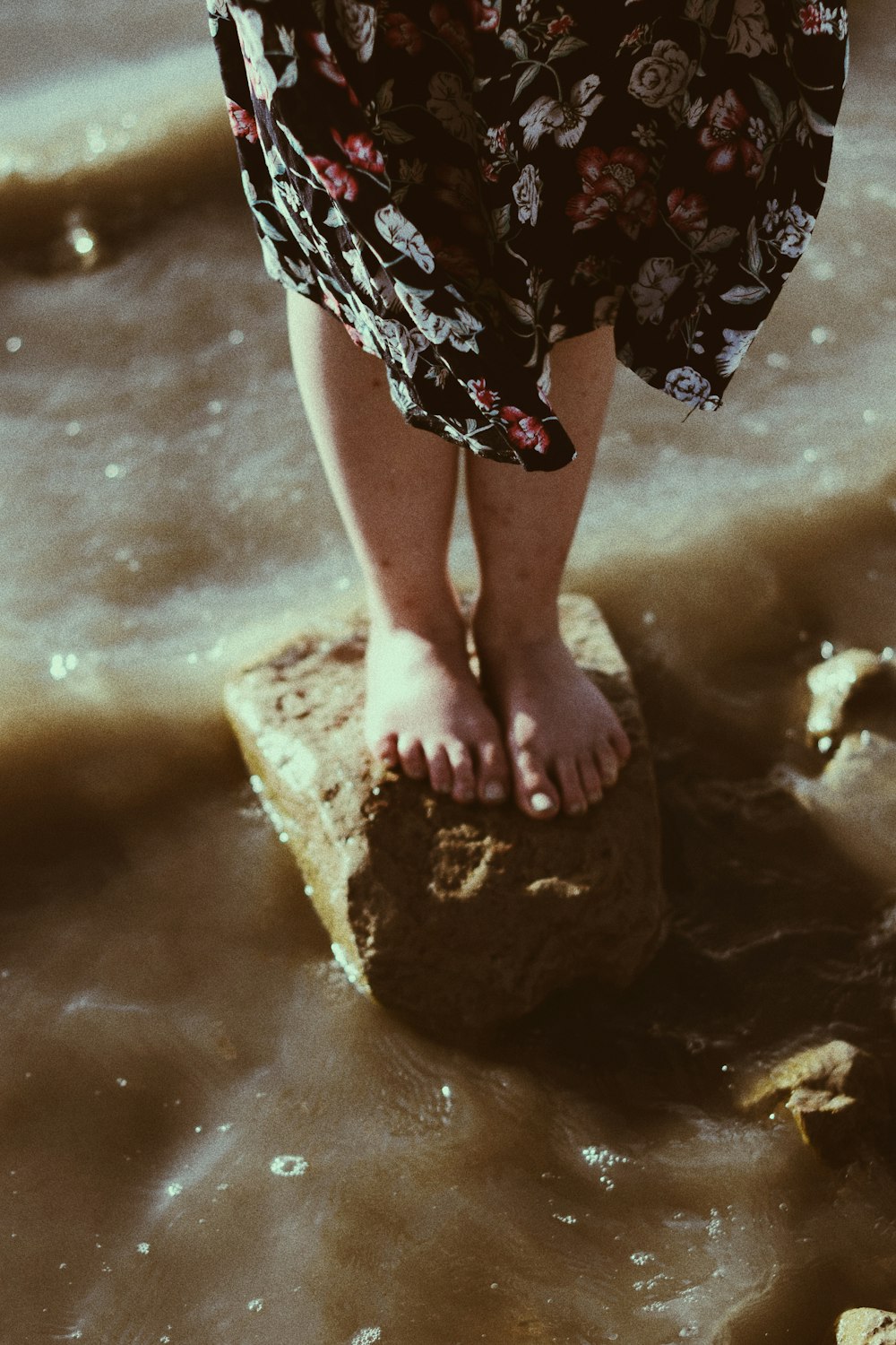 person standing on stone