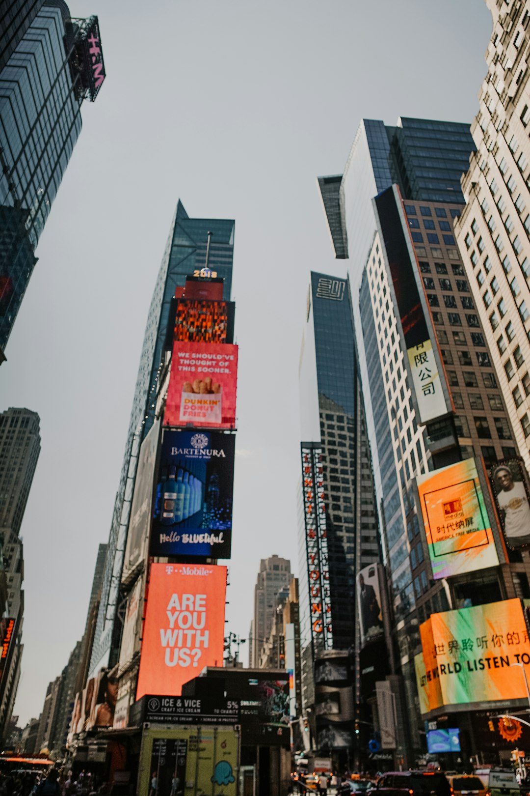 electronic billboards mounted on tall buildings