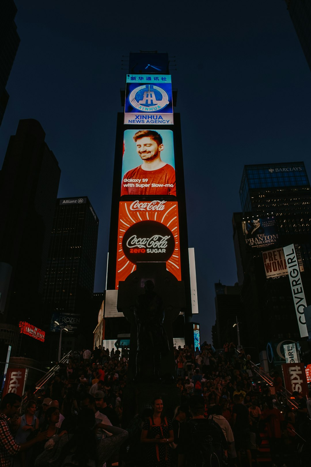 low-angle photography of Coca-Cola tower