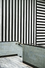 white and black tile stairs ahead